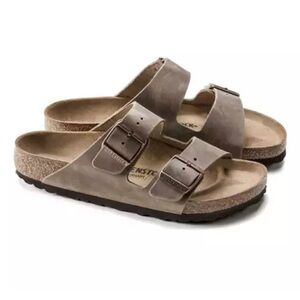 Naturally distressed Birkenstocks. Worn 3-4 times. Suede Arizonas. Size 40.